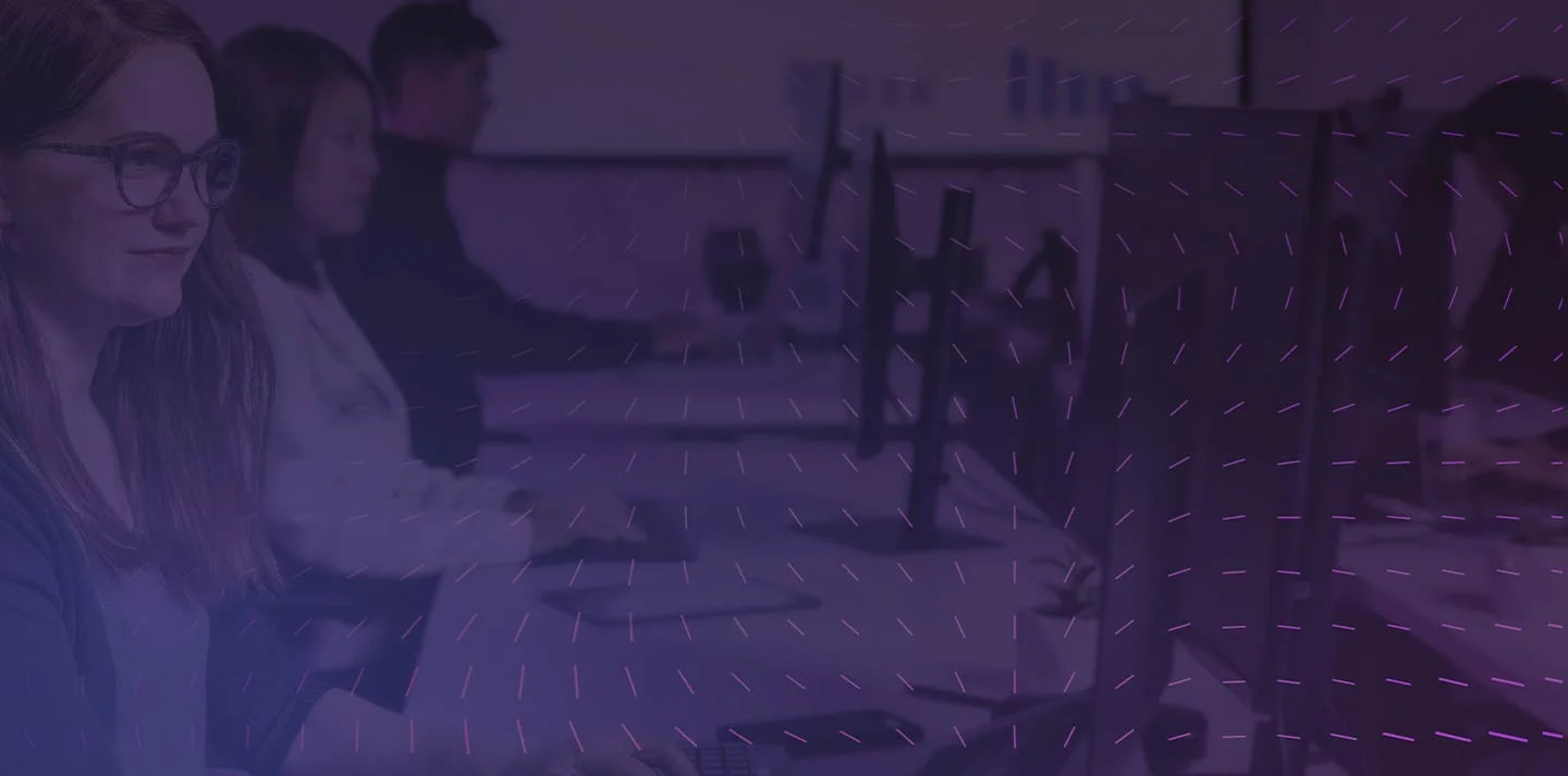 a-row-of-employees-sitting-at-their-desks-working